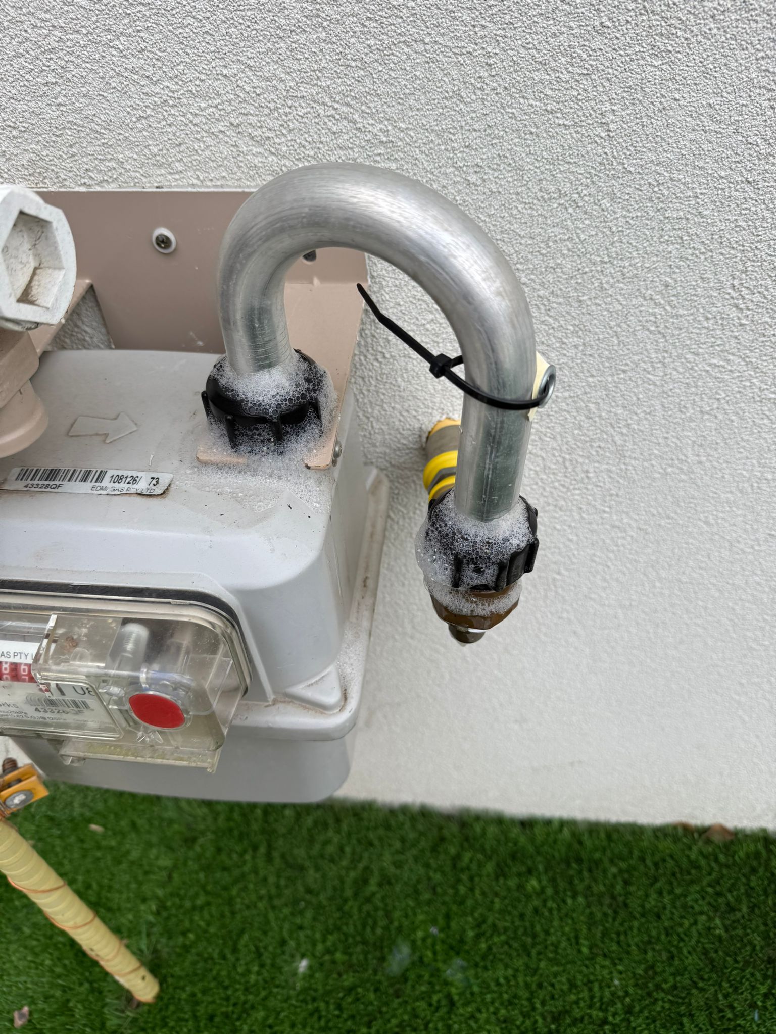 Soap suds gas leak test on meter fitting in Oakleigh Melbourne